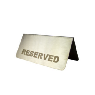tăbliță metalică cu inscripția reserved pentru mese din restaurante și baruri