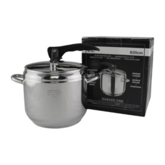 cuctă din inox lângă cutia de carton în care este ambalată